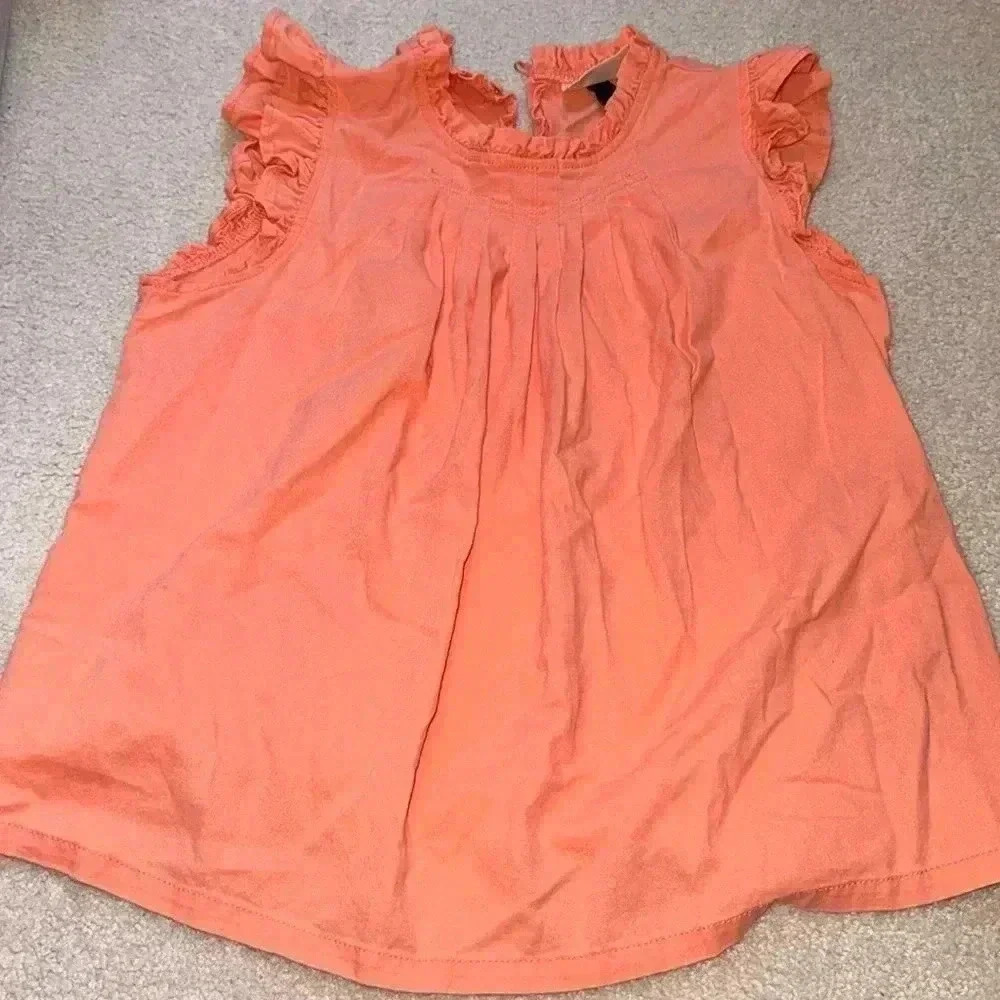 Really cute sleeveless ruffle pleated top